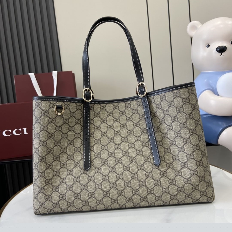 G*u*i shopping bags